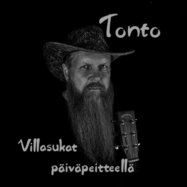 Villasukat päiväpeitteellä