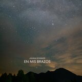 En Mis Brazos