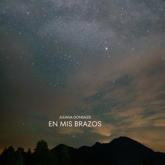 En Mis Brazos