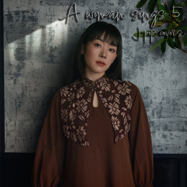 A woman sings 5