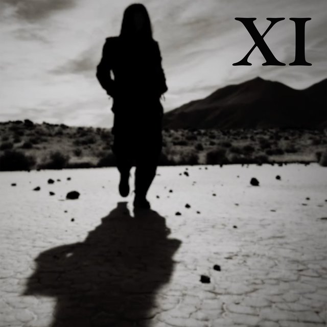XI