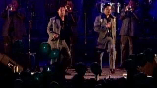 Al Ritmo De La Banda