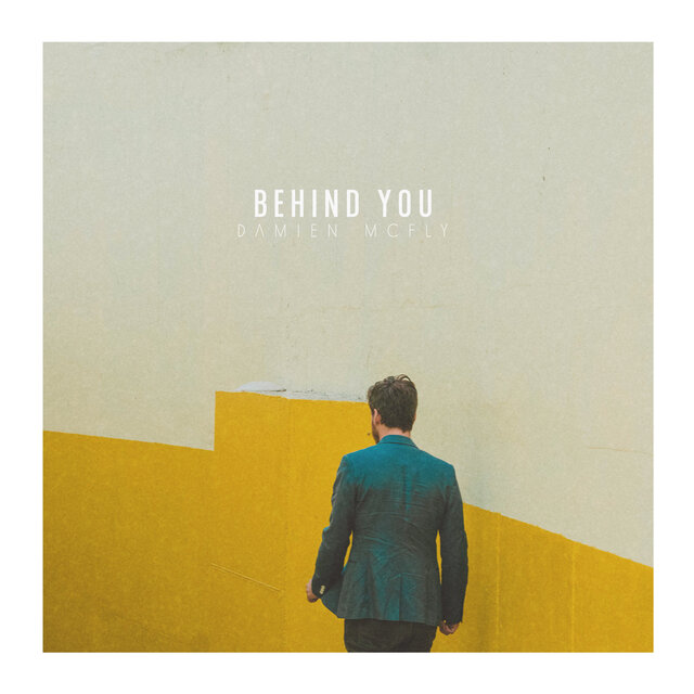 Behind you