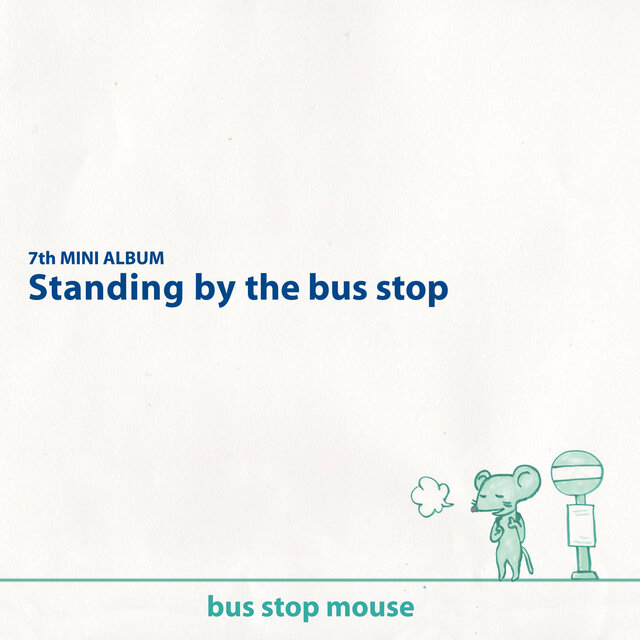 standing by the bus stop