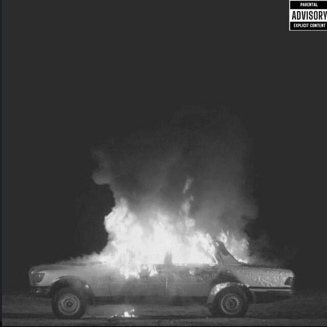 my burning car in the woods