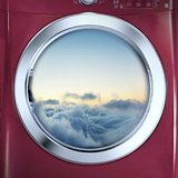 Two Industrial Clothes Dryers on Low